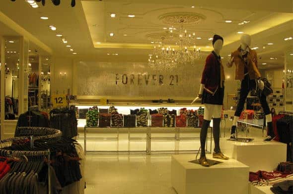 Forever 21 Banner Behind Till with Mannequins