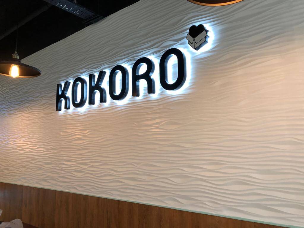 Lit Up Kokoro Logo on Wall